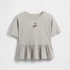 Dziecięca koszulka z nadrukiem peplum Dziecięca koszulka z nadrukiem peplum