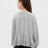 Dziecięcy luźny sweter z baskinką Dziecięcy luźny sweter z baskinką