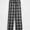 Gap × Disney Tim Burton „Miasteczko Halloween” Flanelowe spodnie piżamowe dla dzieci z czaszką