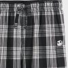 Gap × Disney Tim Burton „Miasteczko Halloween” Flanelowe spodnie piżamowe dla dzieci z czaszką