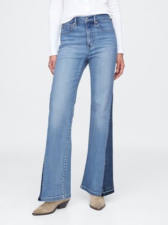 Jeansy dzwony z lat 70. z wysokim stanem i łatami