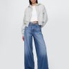 Jeansy UltraSoft Baggy o średnim stanie