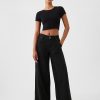 Jeansy UltraSoft Baggy o średnim stanie