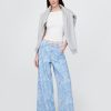 Jeansy UltraSoft Baggy o średnim stanie