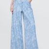 Jeansy UltraSoft Baggy o średnim stanie