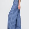 Jeansy UltraSoft Baggy o średnim stanie