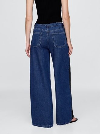 Jeansy UltraSoft Baggy o średnim stanie