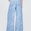 Jeansy UltraSoft Baggy o średnim stanie