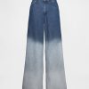 Jeansy UltraSoft Baggy o średnim stanie