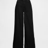 Jeansy UltraSoft Baggy o średnim stanie