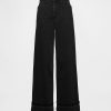 Jeansy UltraSoft Baggy o średnim stanie
