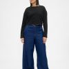 Jeansy UltraSoft Baggy o średnim stanie