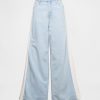 Jeansy UltraSoft Baggy o średnim stanie