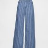 Jeansy UltraSoft Baggy o średnim stanie