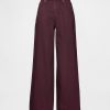 Jeansy UltraSoft Baggy o średnim stanie