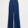 Jeansy UltraSoft Baggy o średnim stanie