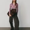Prześwitujący sweter Henley