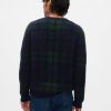 Sweter w kratę z dekoltem w serek