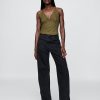 Top typu halter z mieszanki lnu i haftu Top typu halter z mieszanki lnu i haftu