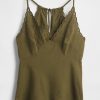 Top typu halter z mieszanki lnu i haftu Top typu halter z mieszanki lnu i haftu