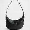 Wegańska skórzana torba typu crossbody z luźną podszewką
