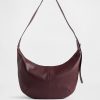 Wegańska skórzana torba typu crossbody z luźną podszewką